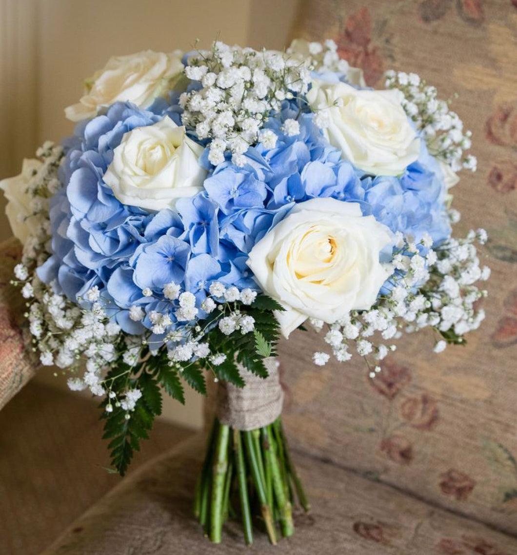 Blue hydrangeas wedding bouquet